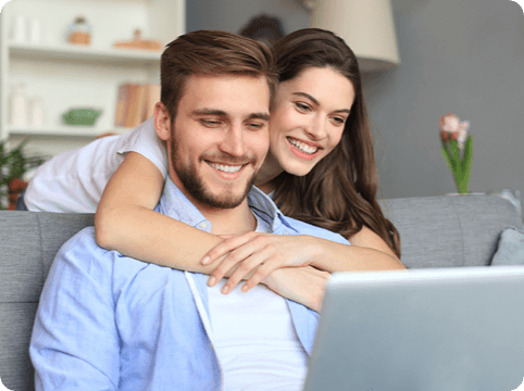 Couple looking at laptop